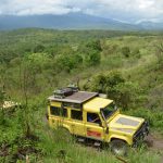 Safari vehicle Meru behind